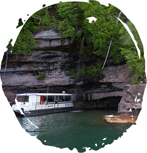 boat tour entering cave